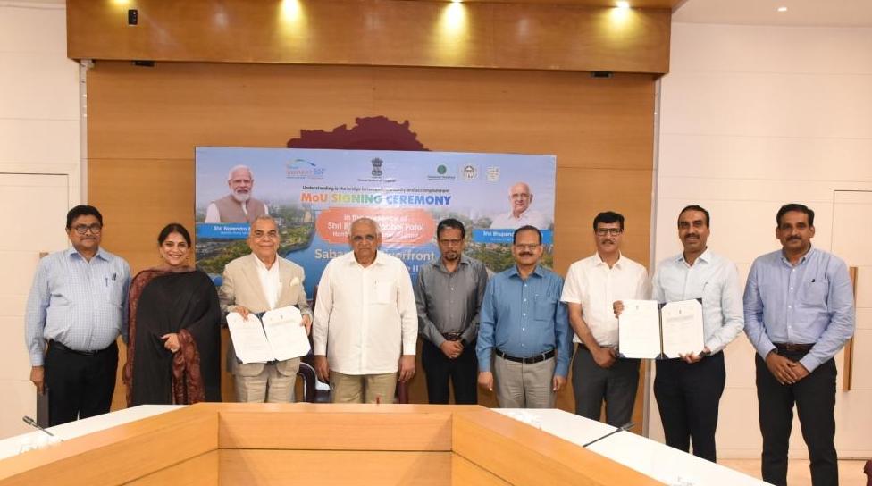 PNC Menon pledges philanthropic outlay of INR 1000 crore for Sabarmati Riverfront project, MoU signed with Gujarat Govt.